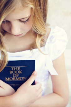girl-holding-book-of-mormon-1062186-print
